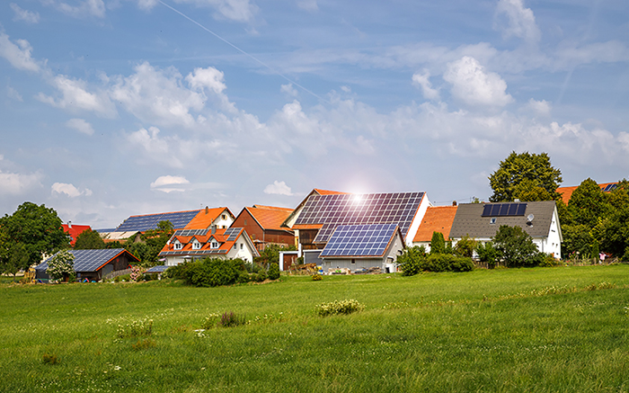 Solar panels on the roof of houses. Green energy